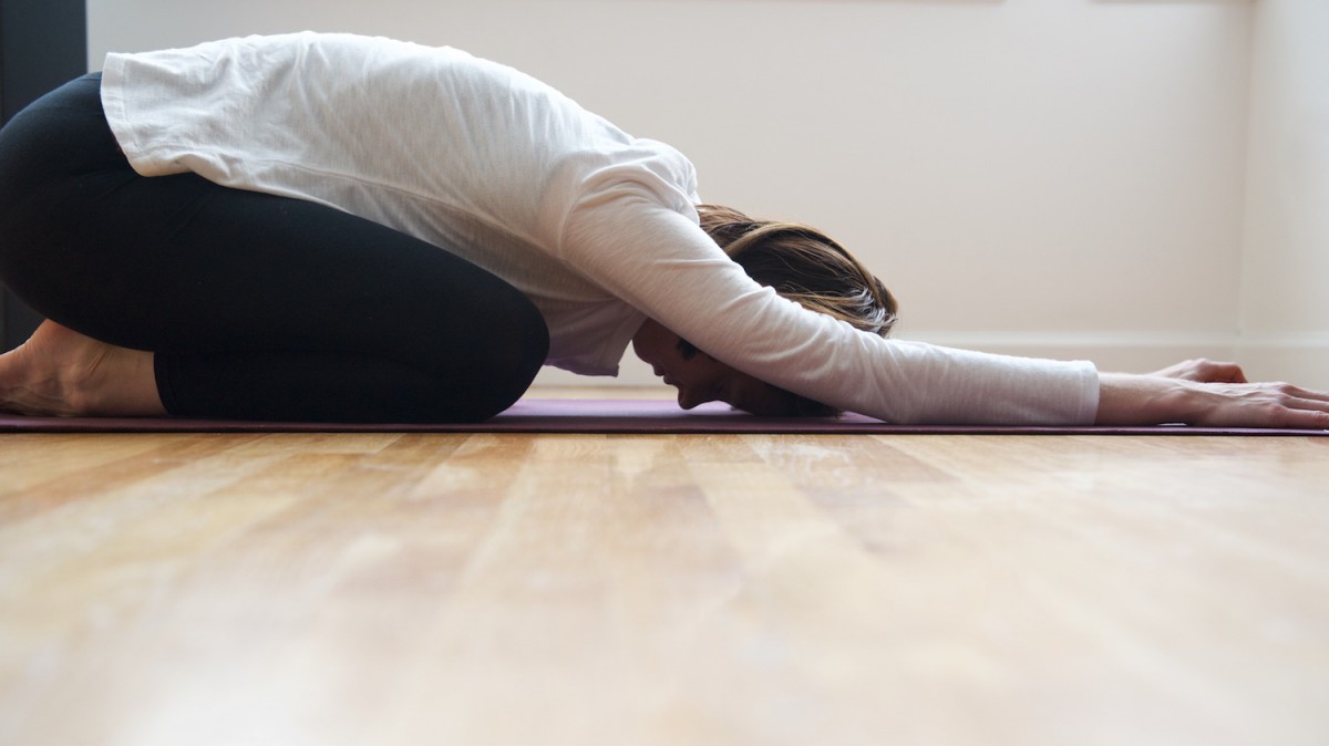 Woman doing yoga child's pose | Karina Louise Photography for Seeing Beauty